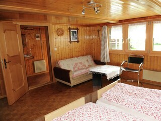 Schlafzimmer mit Gildsteinofen