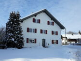 House view from the village square during winter