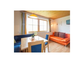 App Dachstein Wohnraum mit ausziehbSchlafsofa