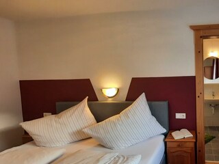 Schlafzimmer mit Badezimmer Apartment Leni