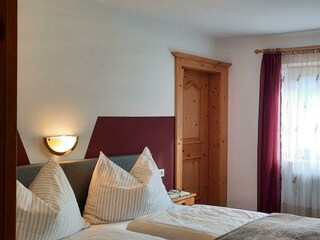 Schlafzimmer mit Badezimmer Apartment Leni