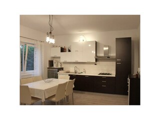 Kitchen with dishwasher and washing machine