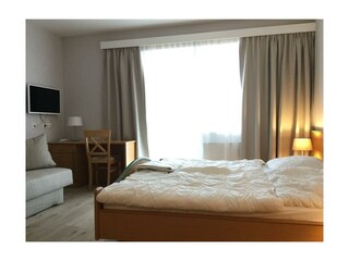 Schlafzimmer mit Balkon