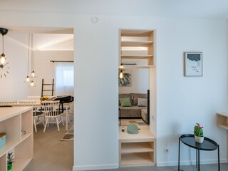 Living room area is in harmony with other rooms