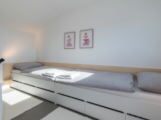 Plenty of light in the twin bed bedroom