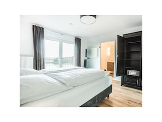 Wohnung 2: Wohnzimmer Ansicht 3