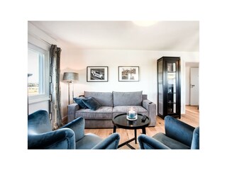 Wohnung 6: Wohnzimmer Ansicht 1