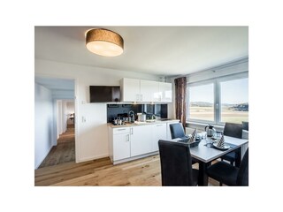 Wohnung 7: Wohnzimmer Ansicht 1