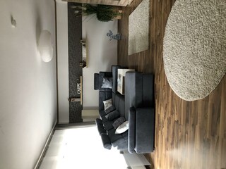 Sofa im Wohnzimmer Ferienwohnung Maria