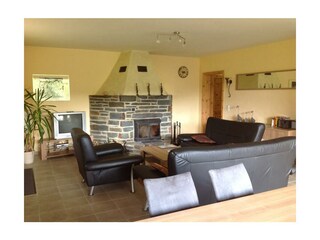 Wohnraum mit Kamin - Haus Hubertus