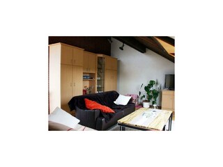 Wohnbereich mit TV in Fewo Nr. 4