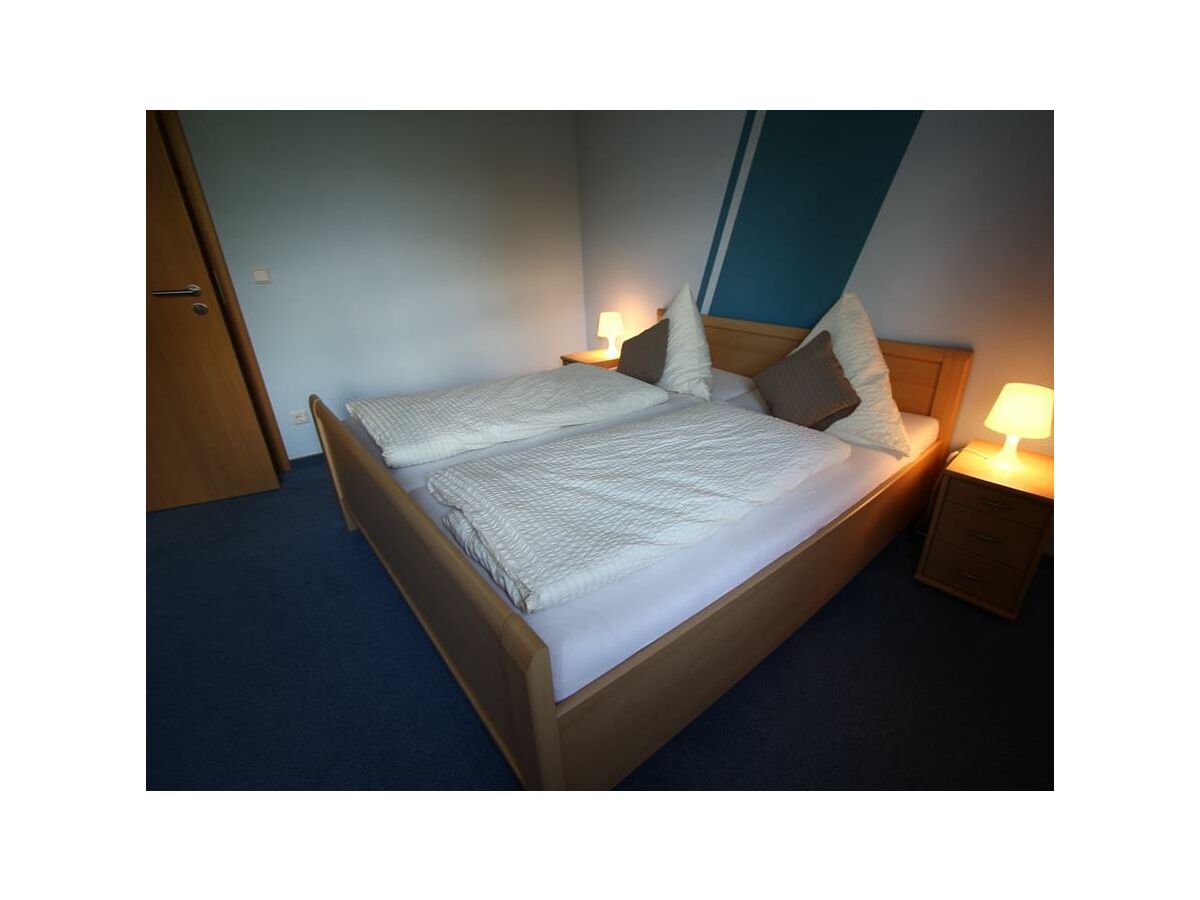 Schlafzimmer mit Doppelbett