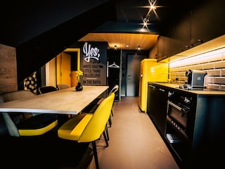 Söll_AparthotelOldSchool_Wohnraum_WilderKaiser