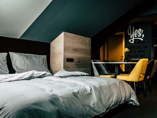 Söll_AparthotelOldSchool_Schlafzimmer_WilderKaiser