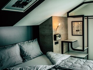 Söll_AparthotelOldSchool_Schlafzimmer_WilderKaiser