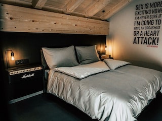 Söll_AparthotelOldSchool_Schlafzimmer_WilderKaiser