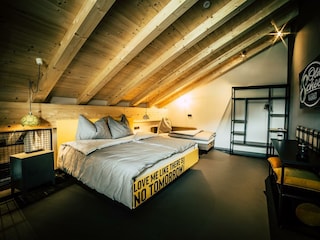 Söll_OldSchool_Schlafzimmer_WilderKaiser