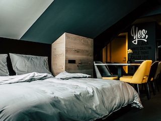 Söll_AparthotelOldSchool_Schlafzimmer_WilderKaiser
