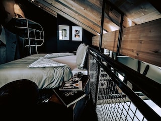 Söll_AparthotelOldSchool_Schlafzimmer_WilderKaiser