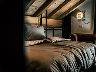 Söll_AparthotelOldSchool_Schlafzimmer_WilderKaiser