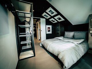 Söll_AparthotelOldSchool_Schlafzimmer_WilderKaiser