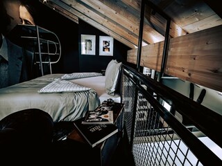 Söll_AparthotelOldSchool_Schlafzimmer_WilderKaiser