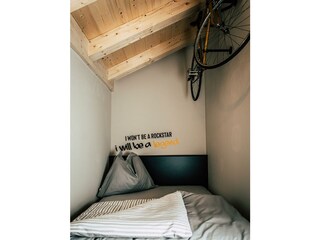 Söll_AparthotelOldSchool_Schlafzimmer_WilderKaiser