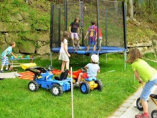 playground with trampolin and lots of play- equipment