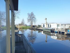 Ferienhaus Wunderschönes Chalet mit eigener Schaluppe und Hafen in Bantega Friesland - Munnekeburen - image1