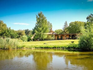 Bungalow Fachwerkloft am Bodden mit Garten und Teich - Buschvitz - image1