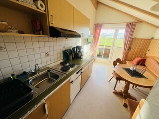 Wohn- und Essbereich mit Balkonzugang