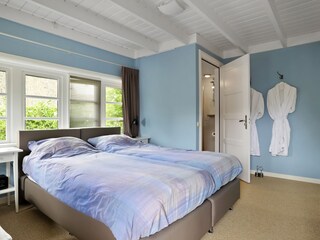 Schlafzimmer mit privates Badezimmer