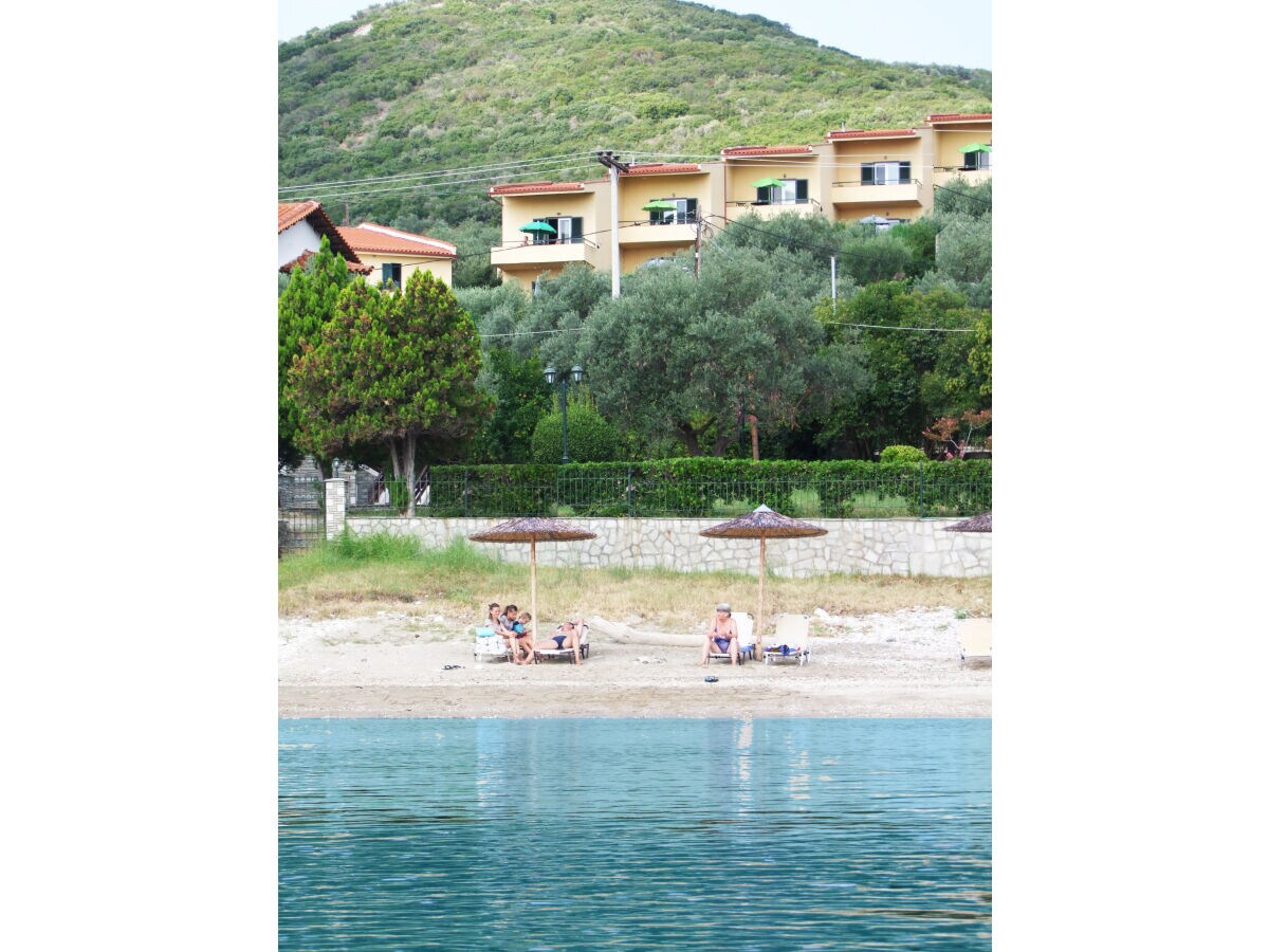 The private beach in front of The Yellow Houses