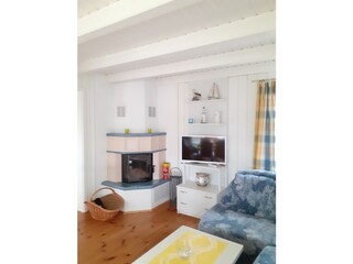 Kachelkamin und Sofaecke