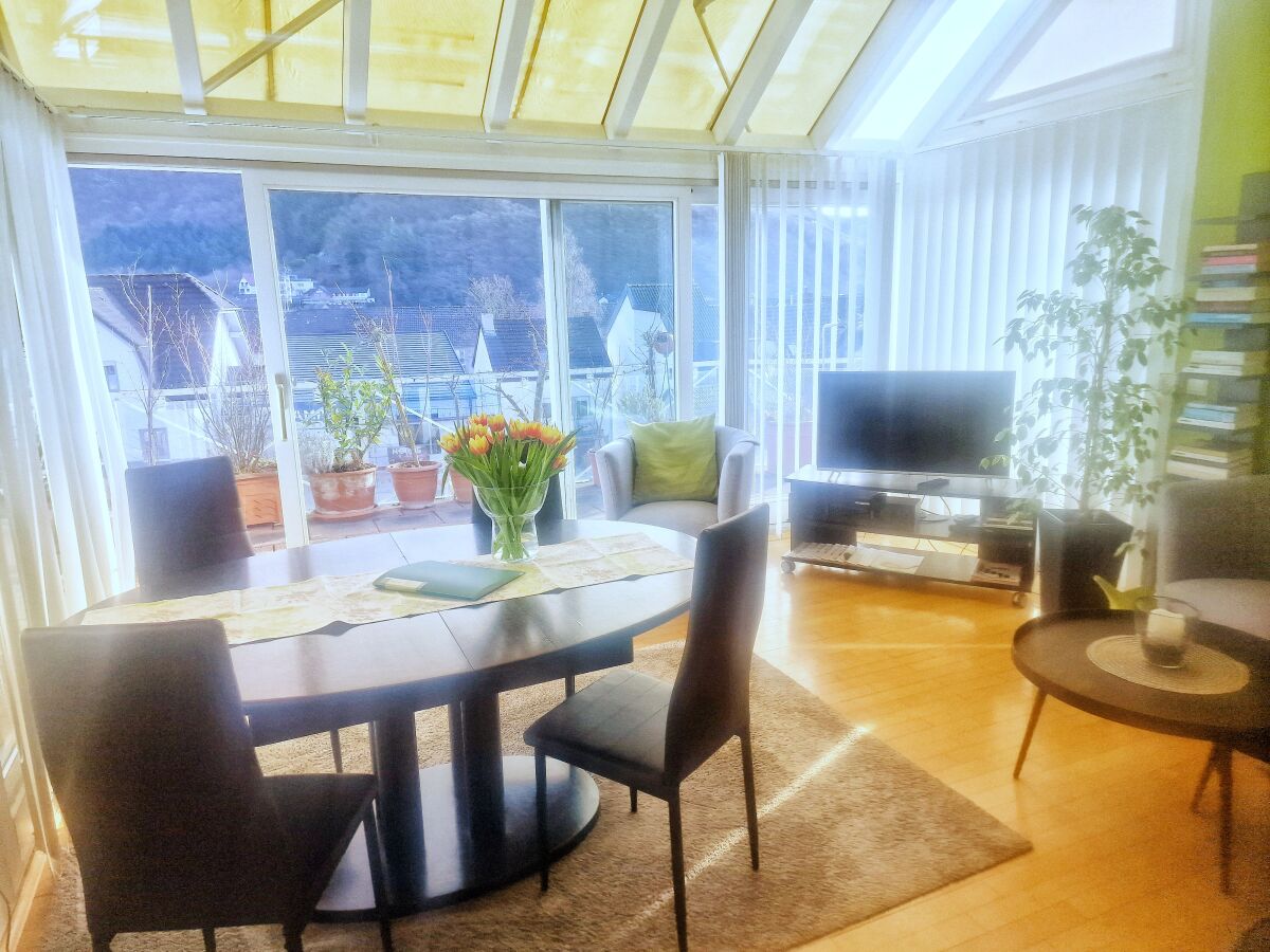 Wohnzimmer mit Wintergarten