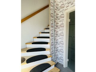 Treppenaufgang zur Ferienwohnung