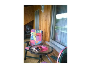 Loggia mit Sitzmöbel