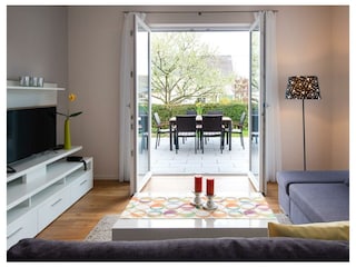 Wohnzimmer und Terrasse Ferienwohnung "Valentina"