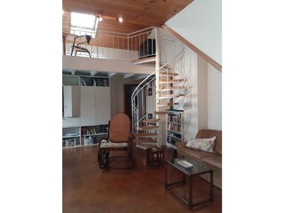 Wohn-Esszimmer mit Empore