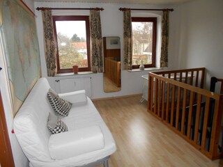 Studio mit ausklappbarer Schlafcouch, Blick i.d. Garten