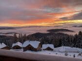 Sonnenuntergang mit Blick über die Alpenlandschaft