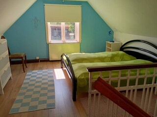 Schlafzimmer mit Doppelbett