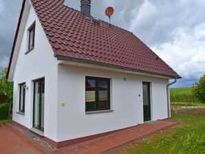 Holiday house Holiday home with fireplace in Mechelsdorf - Bastorf - image1