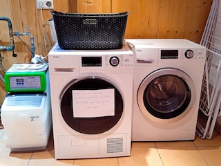 The pantry with washing machine and freezer