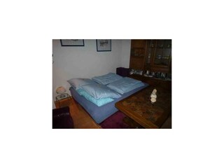 Schlafmöglichkeit im Wohnzimmer