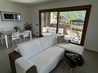 living and view of fully equipped terrace