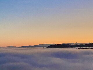 floating above the clouds