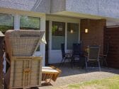 Terrasse mit Strandkorb an der Ferienwohnung Inselblume 15 auf Fehmarn