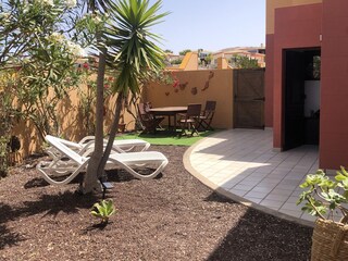 The garden is part of the apartment