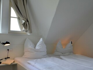 Schlafzimmer Meerblick mit Bad en-Suite OG